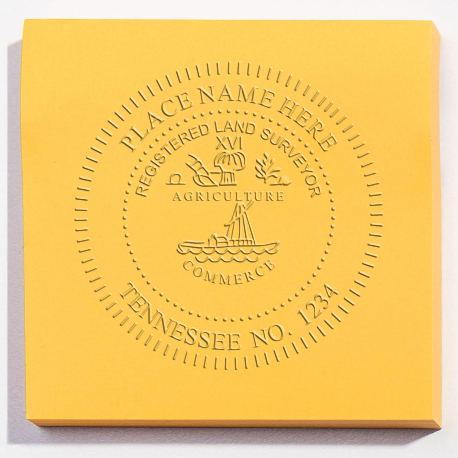 A lifestyle photo showing a stamped image of the State of Tennessee Soft Land Surveyor Embossing Seal on a piece of paper