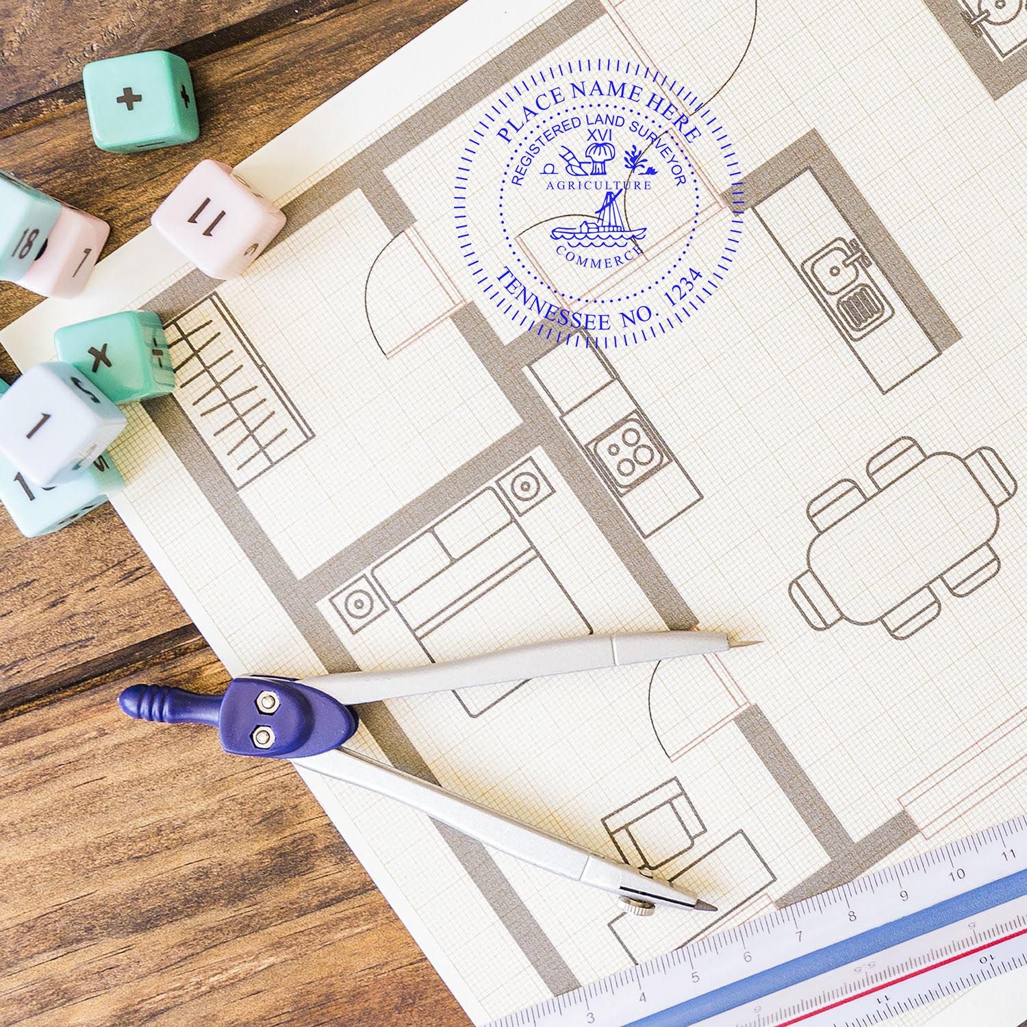 Self Inking Tennessee Land Surveyor Stamp on a floor plan with drafting tools and dice on a wooden table.