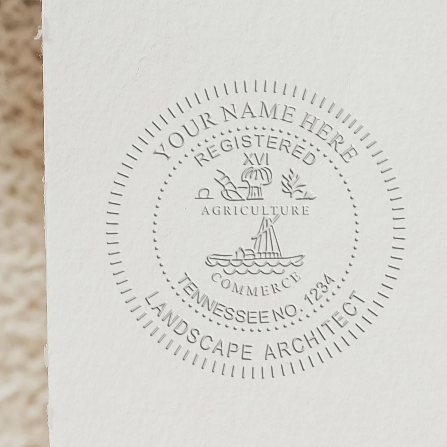 A stamped impression of the State of Tennessee Handheld Landscape Architect Seal in this stylish lifestyle photo, setting the tone for a unique and personalized product.