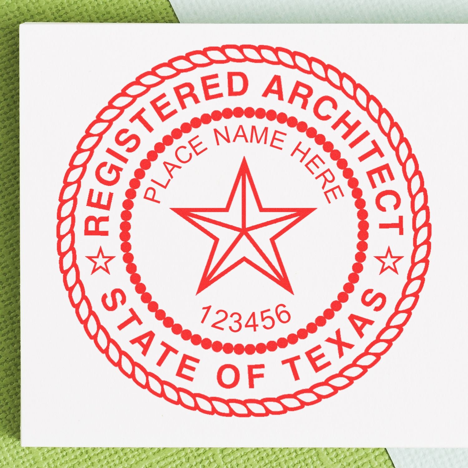 Premium MaxLight Pre-Inked Texas Architectural Stamp in red ink on white paper, displaying "Registered Architect State of Texas" with a star in the center.