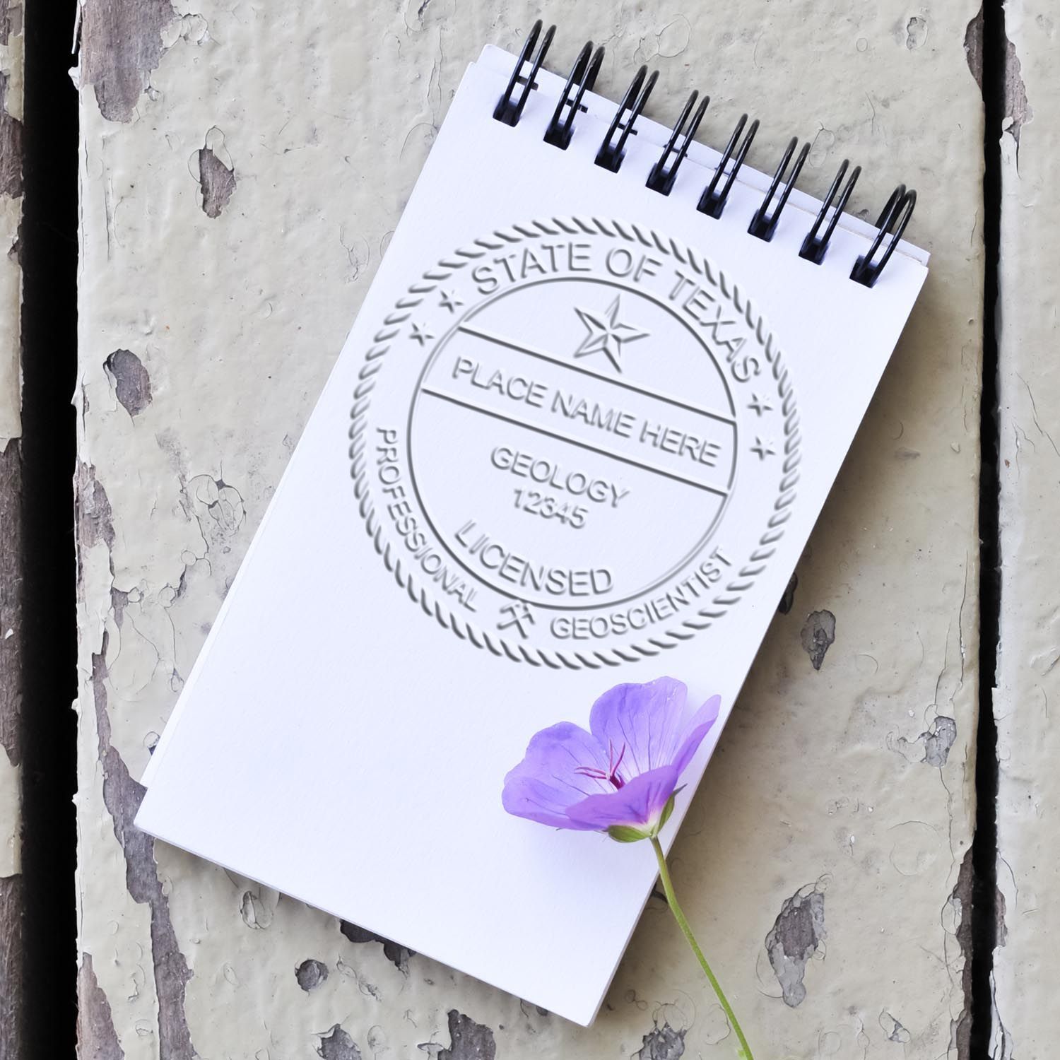 A stamped imprint of the Texas Geologist Desk Seal in this stylish lifestyle photo, setting the tone for a unique and personalized product.