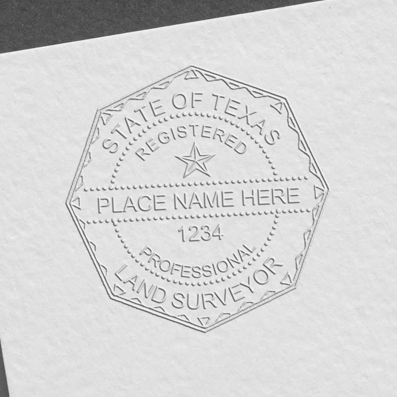 A lifestyle photo showing a stamped image of the Texas Desk Surveyor Seal Embosser on a piece of paper