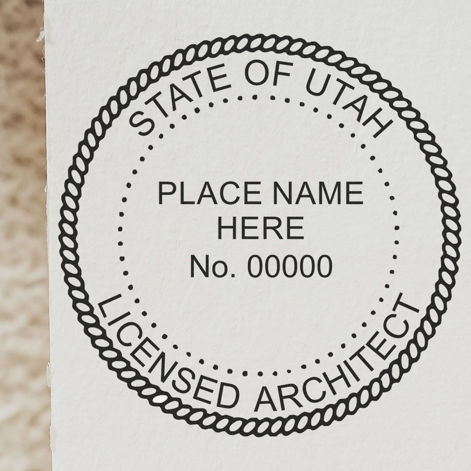 Self Inking Utah Architect Stamp with customizable name and license number, featuring a circular design with State of Utah Licensed Architect.