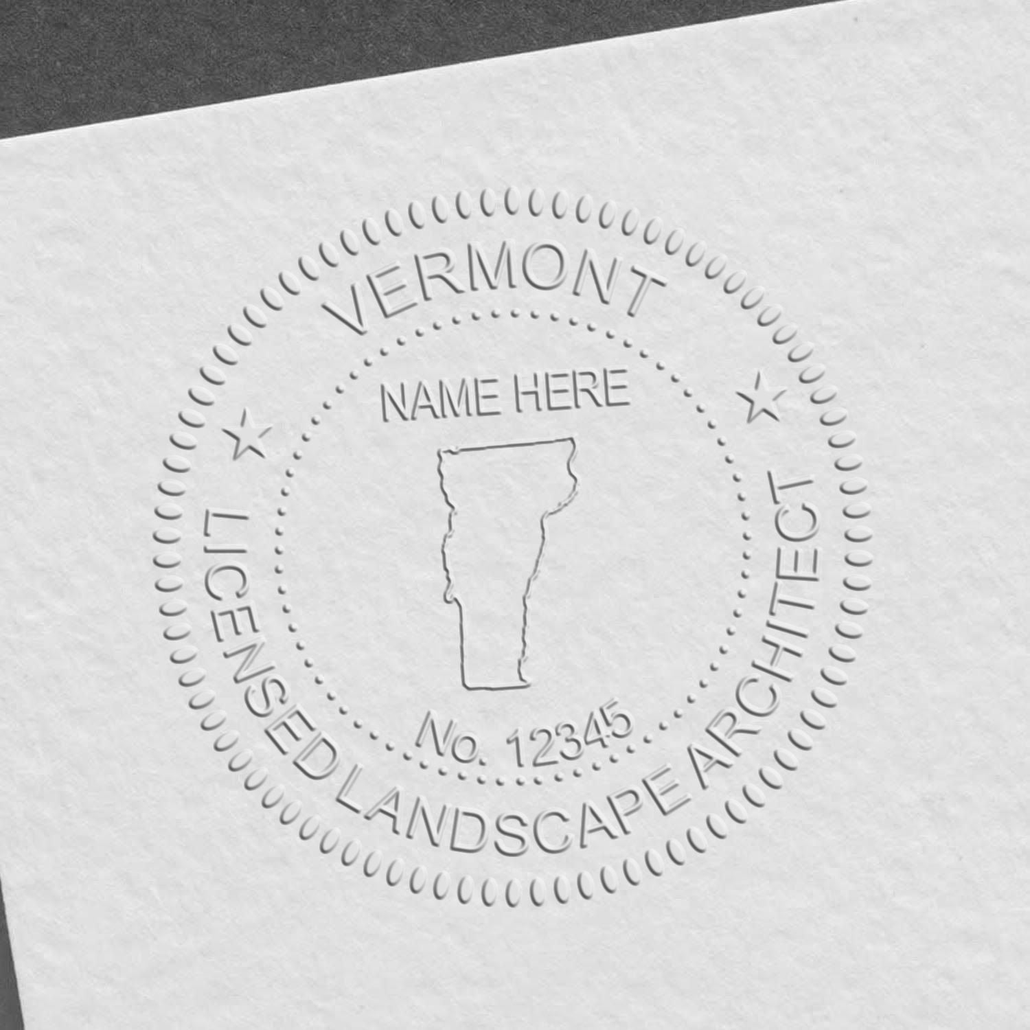 A photograph of the State of Vermont Handheld Landscape Architect Seal stamp impression reveals a vivid, professional image of the on paper.