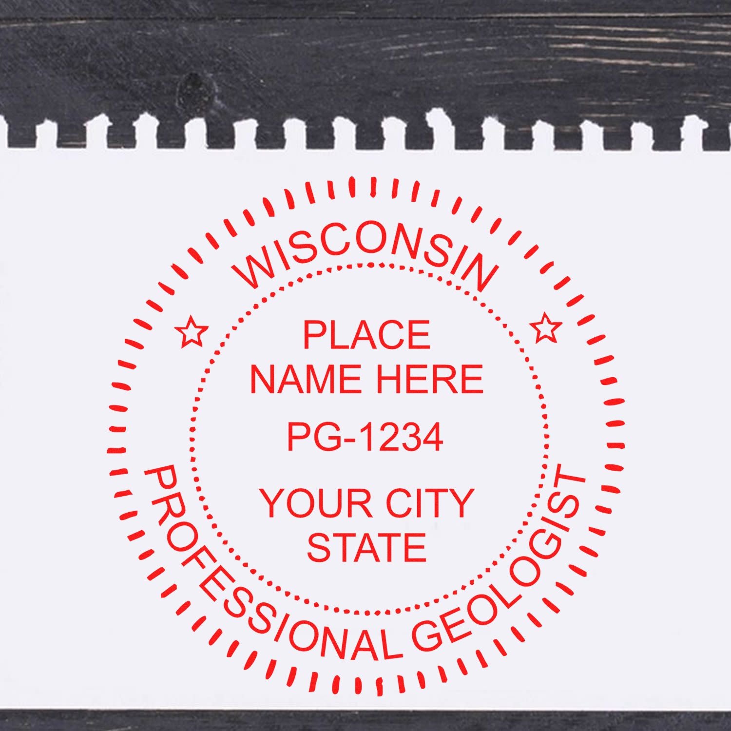 An in use photo of the Slim Pre-Inked Wisconsin Professional Geologist Seal Stamp showing a sample imprint on a cardstock