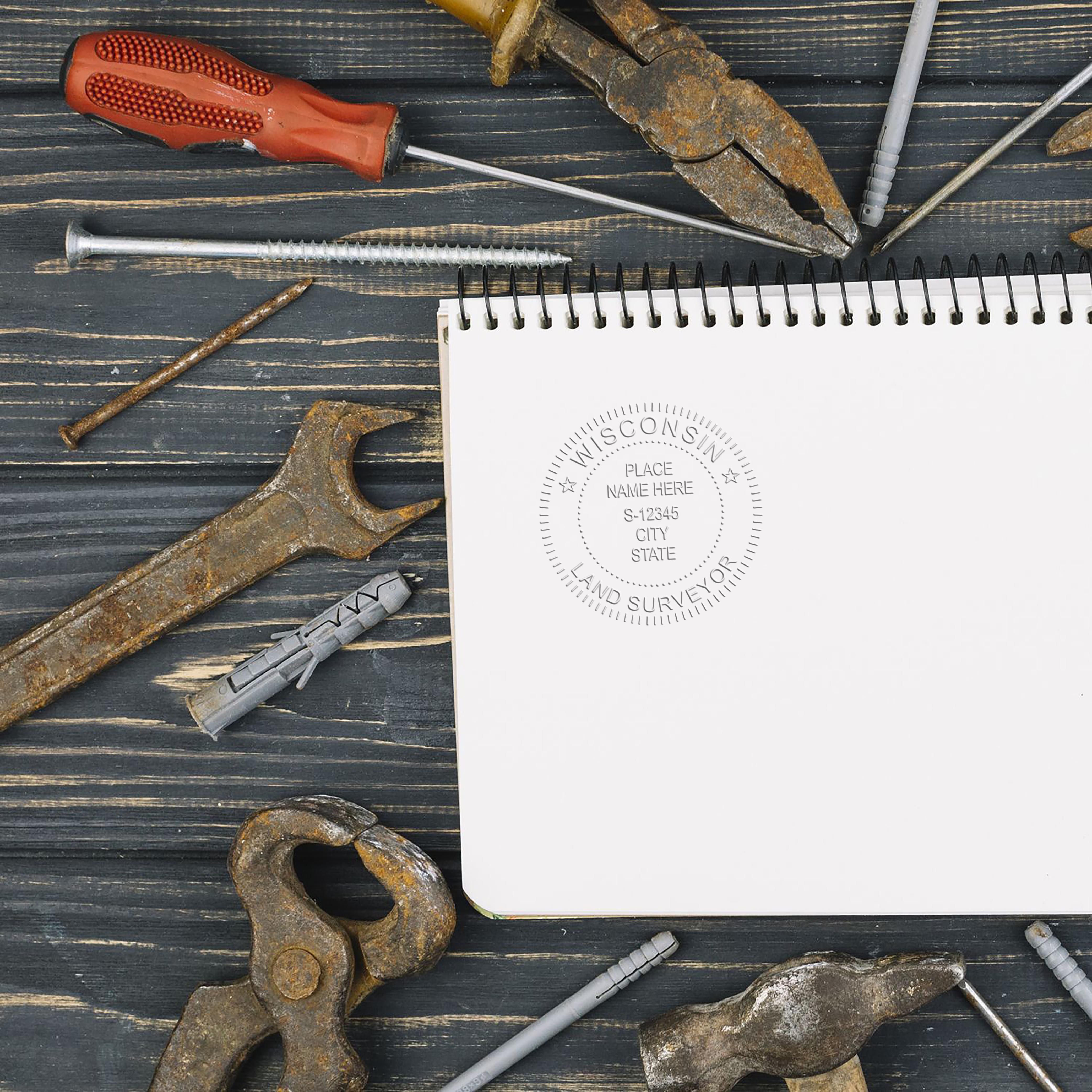 The Extended Long Reach Wisconsin Surveyor Embosser stamp impression comes to life with a crisp, detailed photo on paper - showcasing true professional quality.