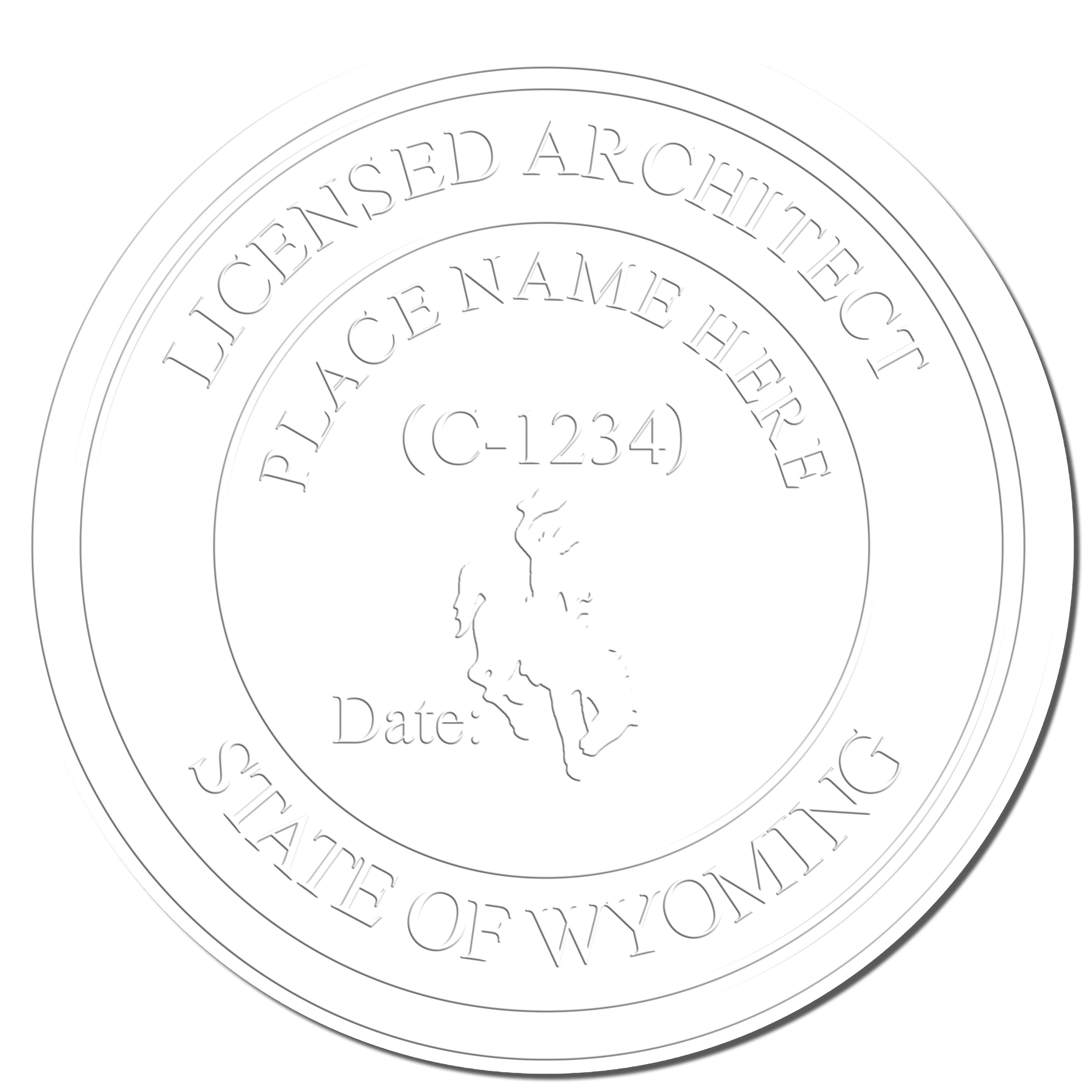 This paper is stamped with a sample imprint of the Heavy Duty Cast Iron Wyoming Architect Embosser, signifying its quality and reliability.