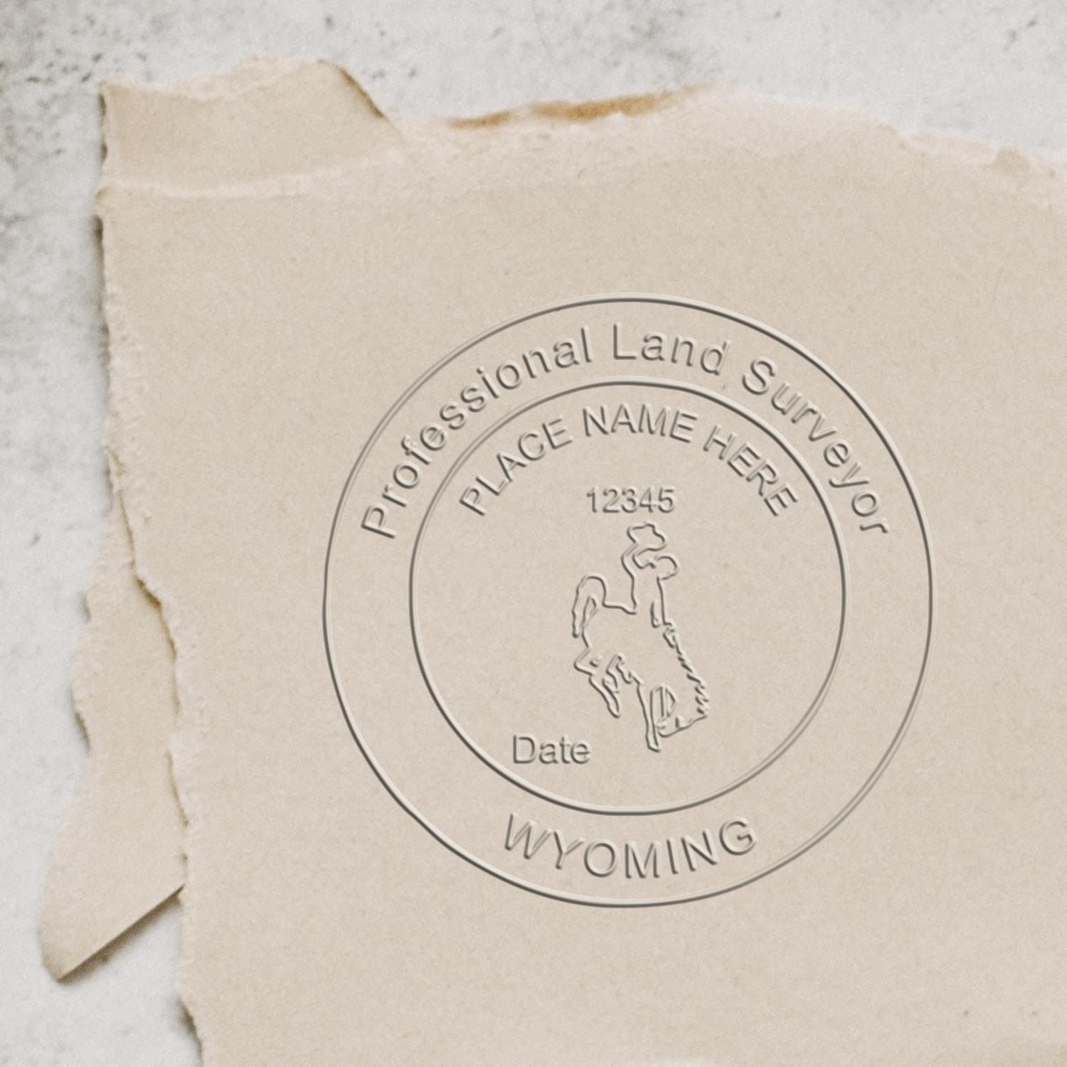 A photograph of the State of Wyoming Soft Land Surveyor Embossing Seal stamp impression reveals a vivid, professional image of the on paper.