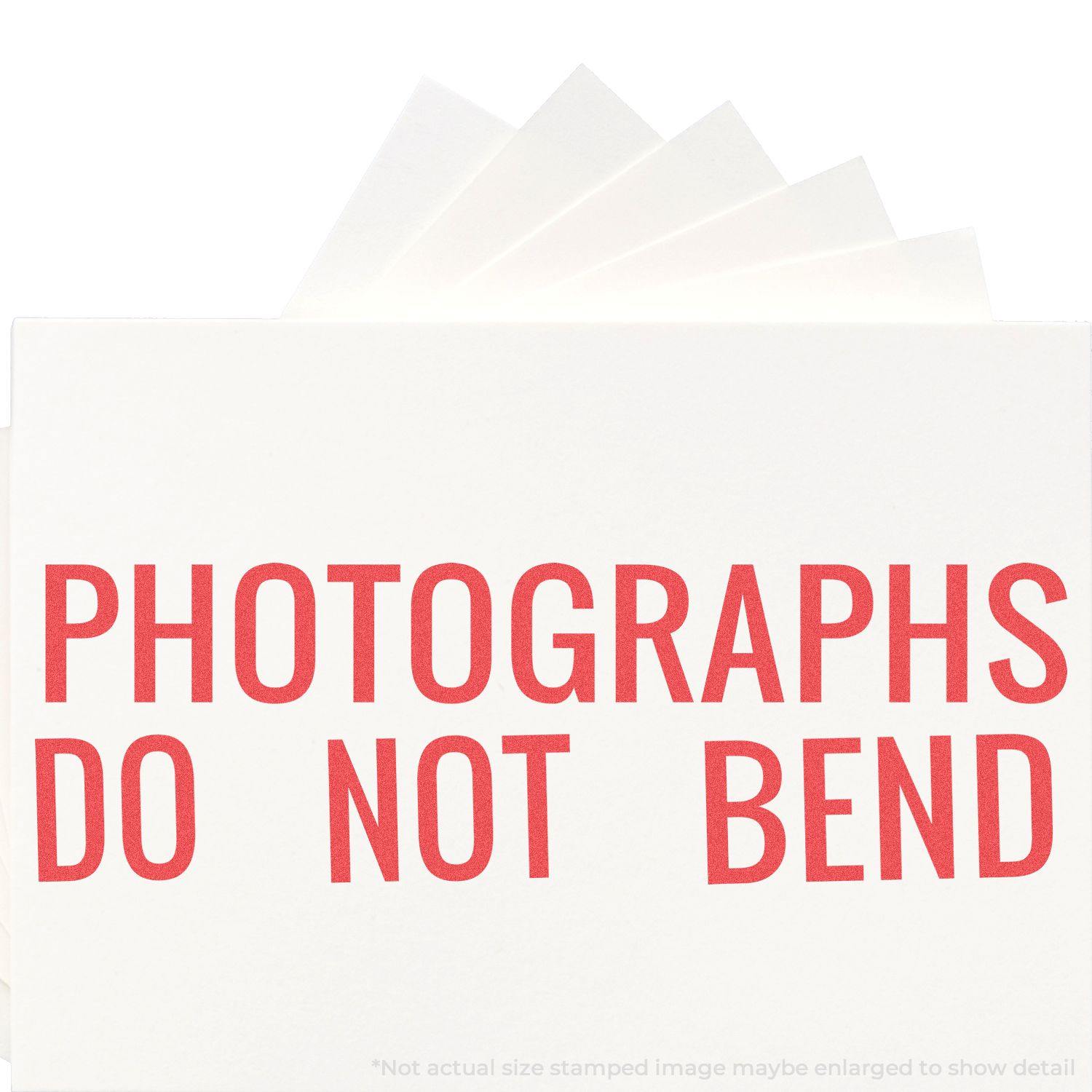 Envelope stamped with 'Photographs Do Not Bend' using the Jumbo Photographs Do Not Bend Xstamper Stamp, with papers inside.